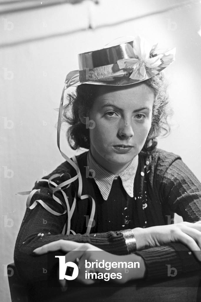 Portrait of a young woman at a carnival, Germany 1930s (b/w photo)