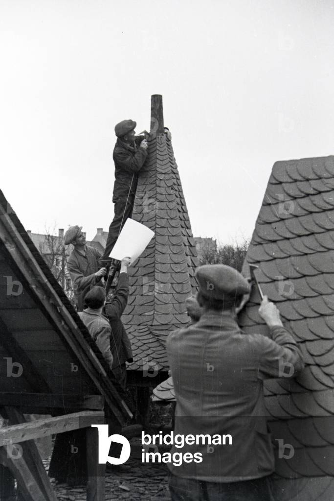 Trainees of a roofer school at a tutorial, Germany 1937 (b/w photo)
