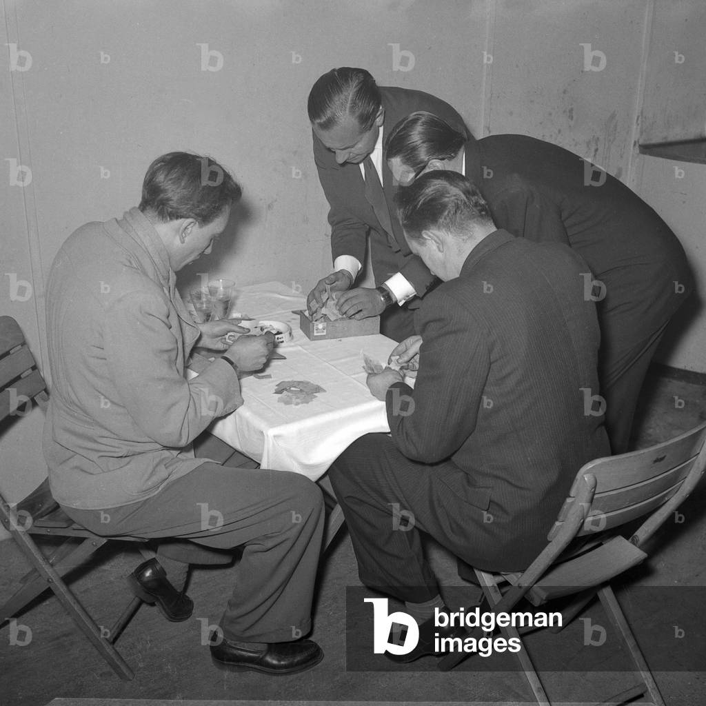 Men counting tickets, Hamburg 1953