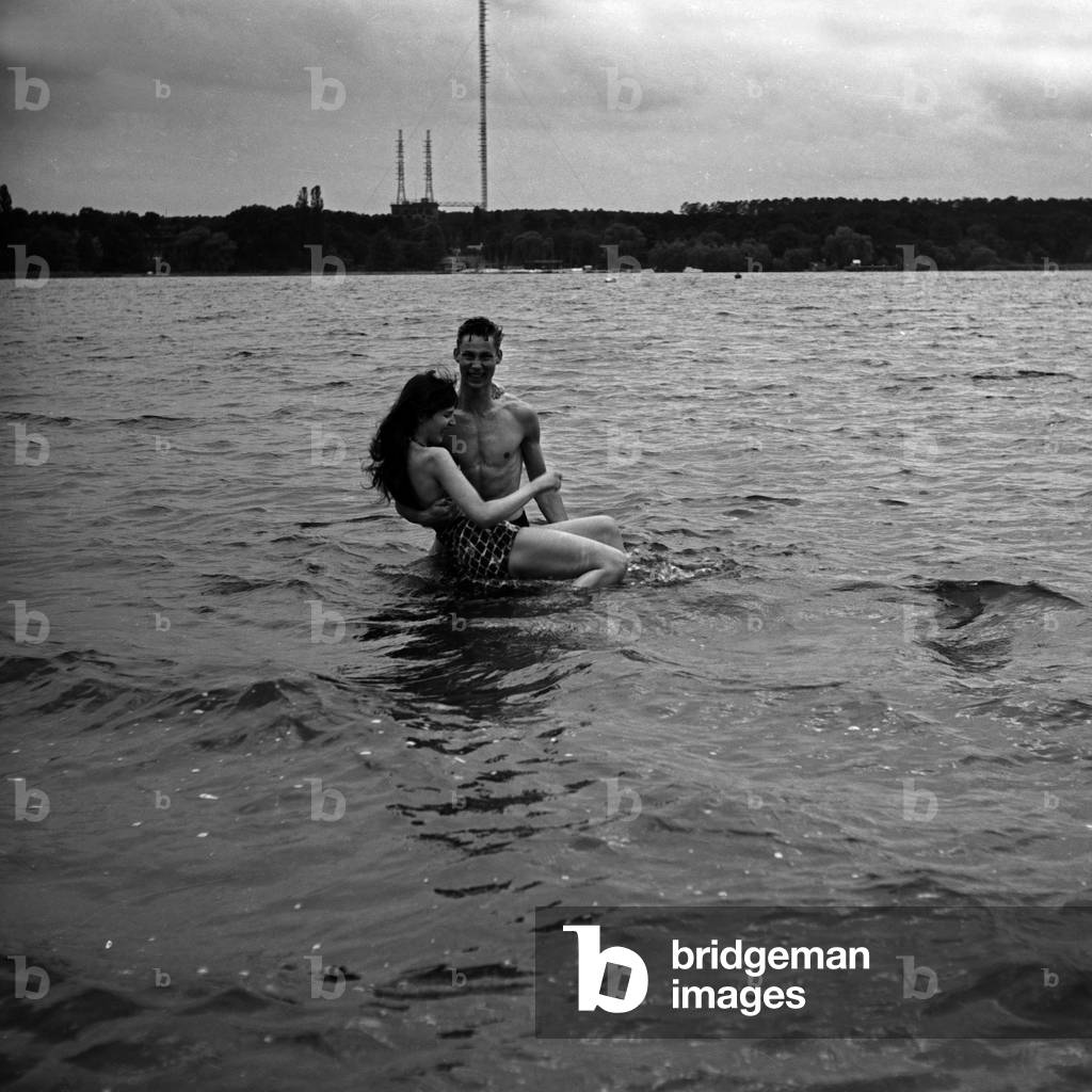 Siblings Maria and Franco Duval swimming on a lake at Berlin, Germany 1950s