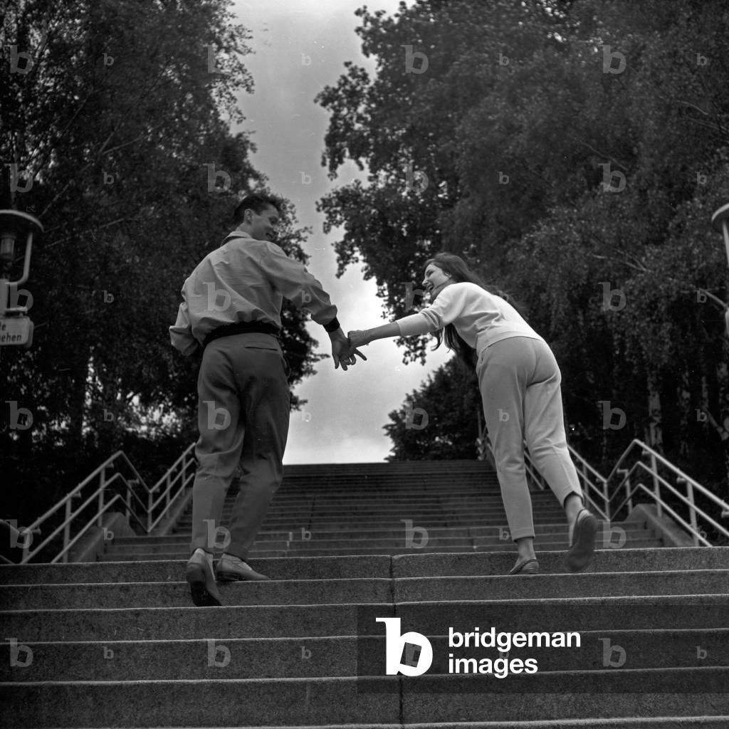 Siblings Maria and Franco Duval strolling through Berlin, Germany 1950s