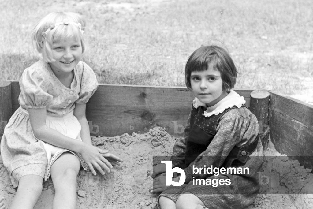 Scenes from childhood in Germany during the 1930s (b/w photo)