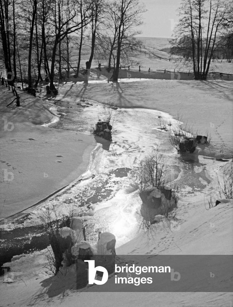 Icy river Stradick near Zinten, East Prussia, 1930s (b/w photo)