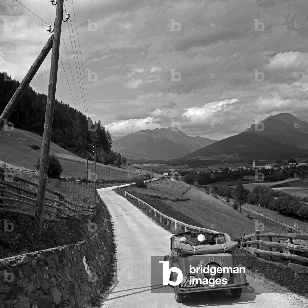 Travelling through Austria in an Opel Olympia, 1930s (b/w photo)