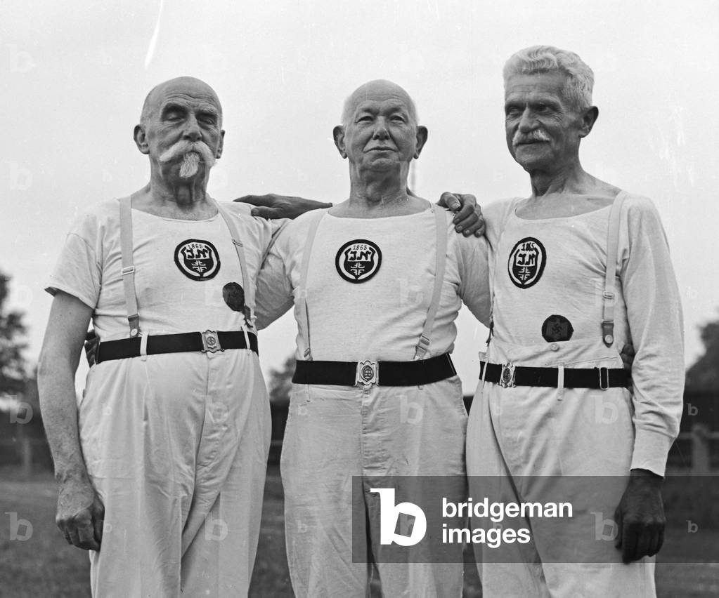 Members of a senior department of a gymnastic club exercising, Germany 1930s (b/w photo)