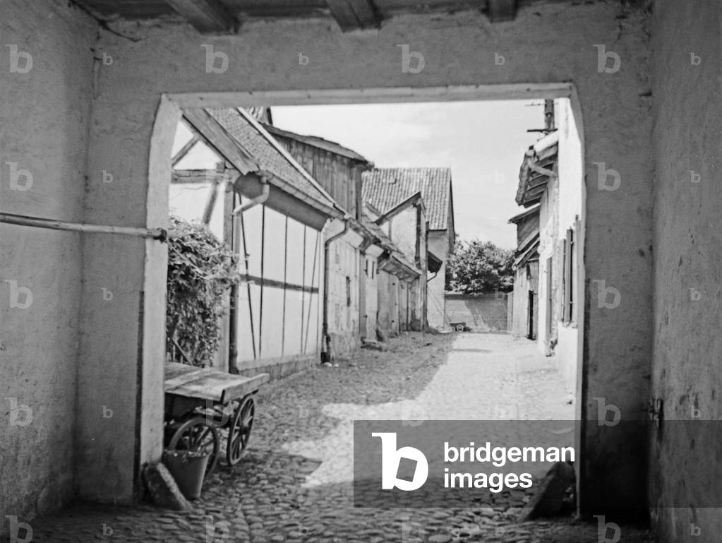 View to a little lane in Friedland, East Prussia, 1930s (b/w photo)