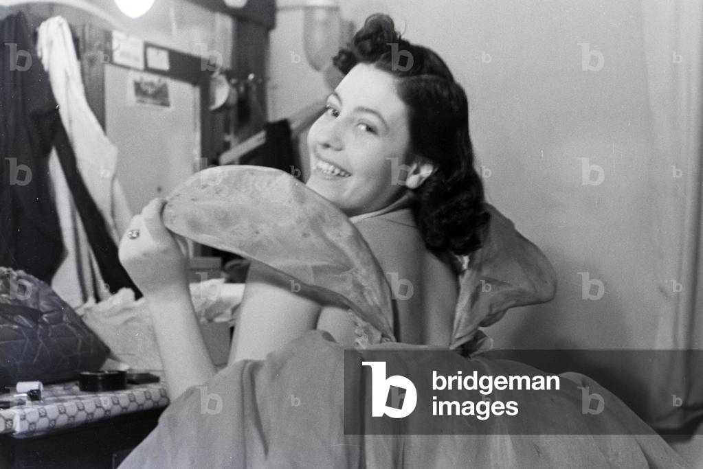 Chorus girl in the changing room in the opera in Rome, Italy 1940s (b/w photo)