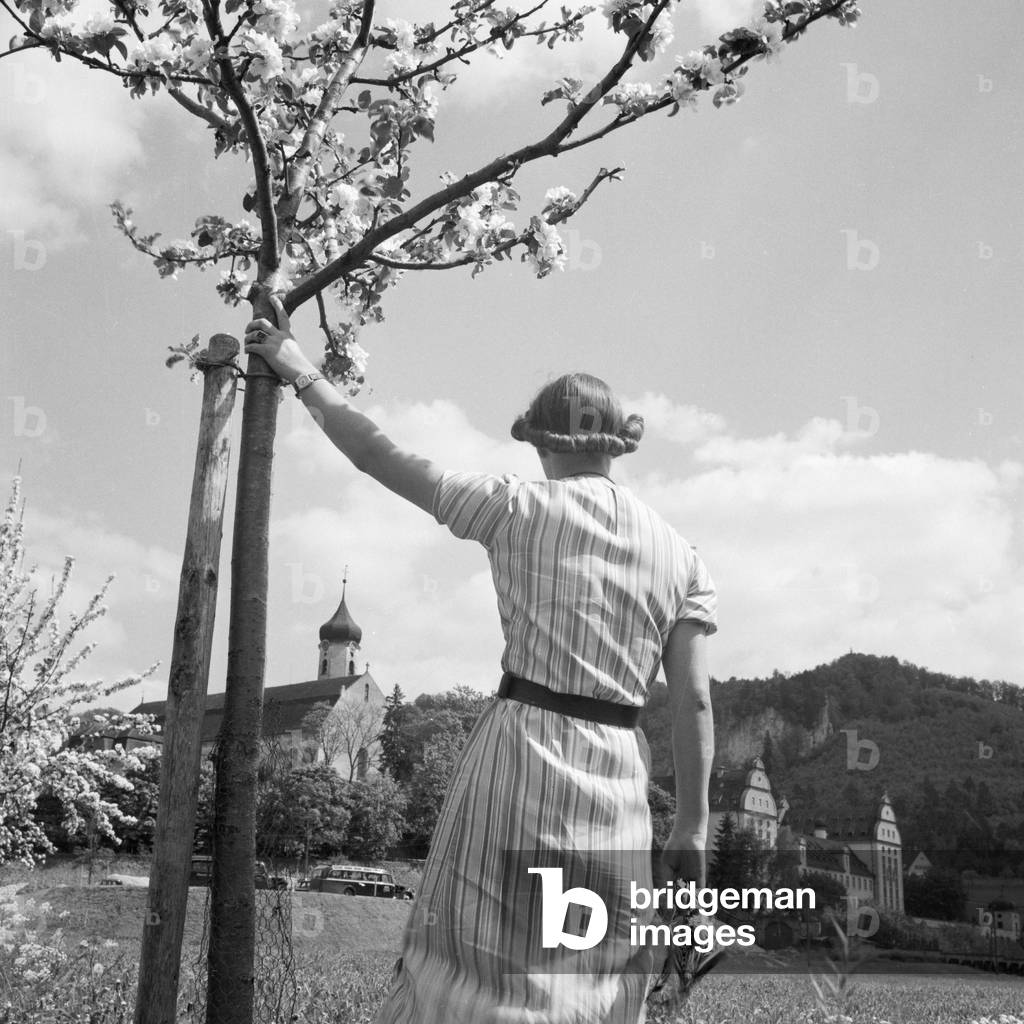 Woman in spring time near Beuron Benedictine monastery in upper Danube, Germany 1930s (b/w photo)