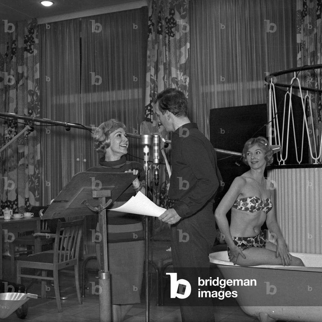 German actors Gisela Trowe and Hanns Lothar speaking in an audio play at NDR studio in Hamburg, Germany 1960s