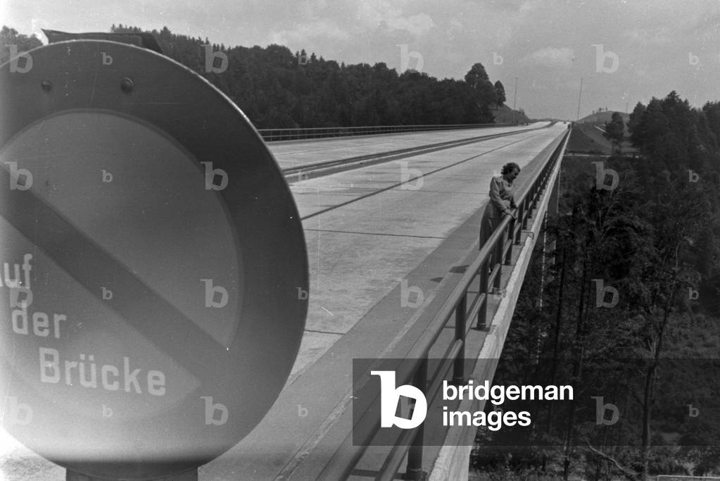 On Mangfallbruecke bridge near Weyarn in Bavaria, Germany 1930s (b/w photo)
