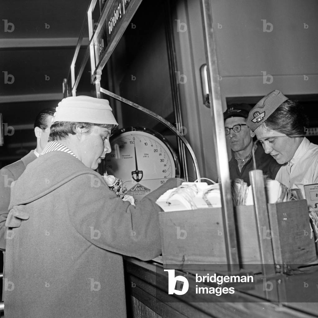 at the boarding and passport checkpoint of Hamburg airport, Germany 1950s