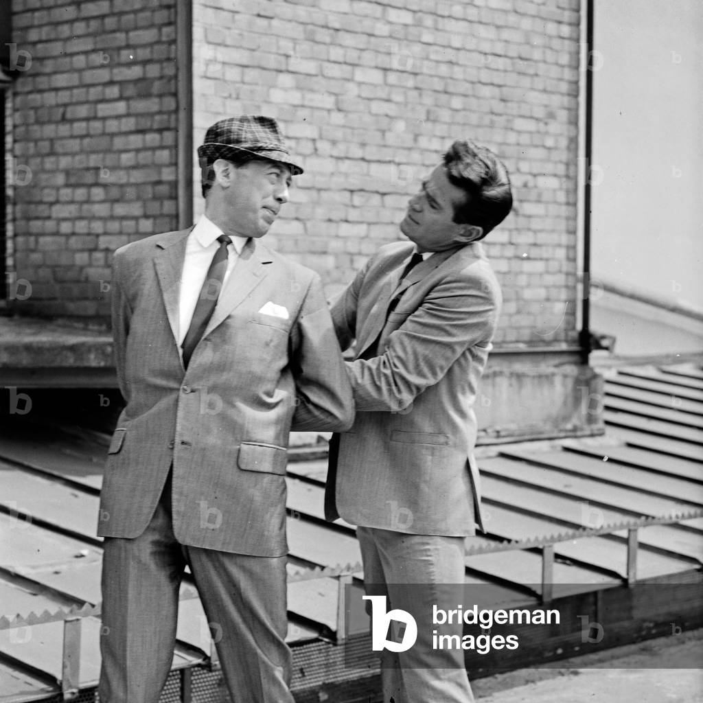 Actors Horst Tappert (left) and George Nader on the rooftops of Hamburg, Germany 1960s
