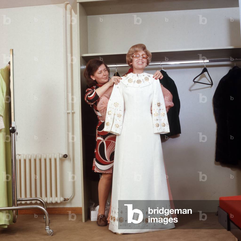 German opera singer at her tailor, Germany 1970s