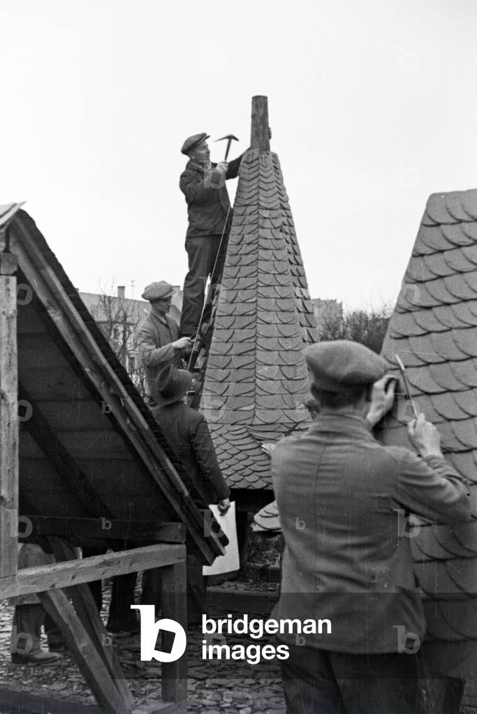Trainees of a roofer school at a tutorial, Germany 1937 (b/w photo)