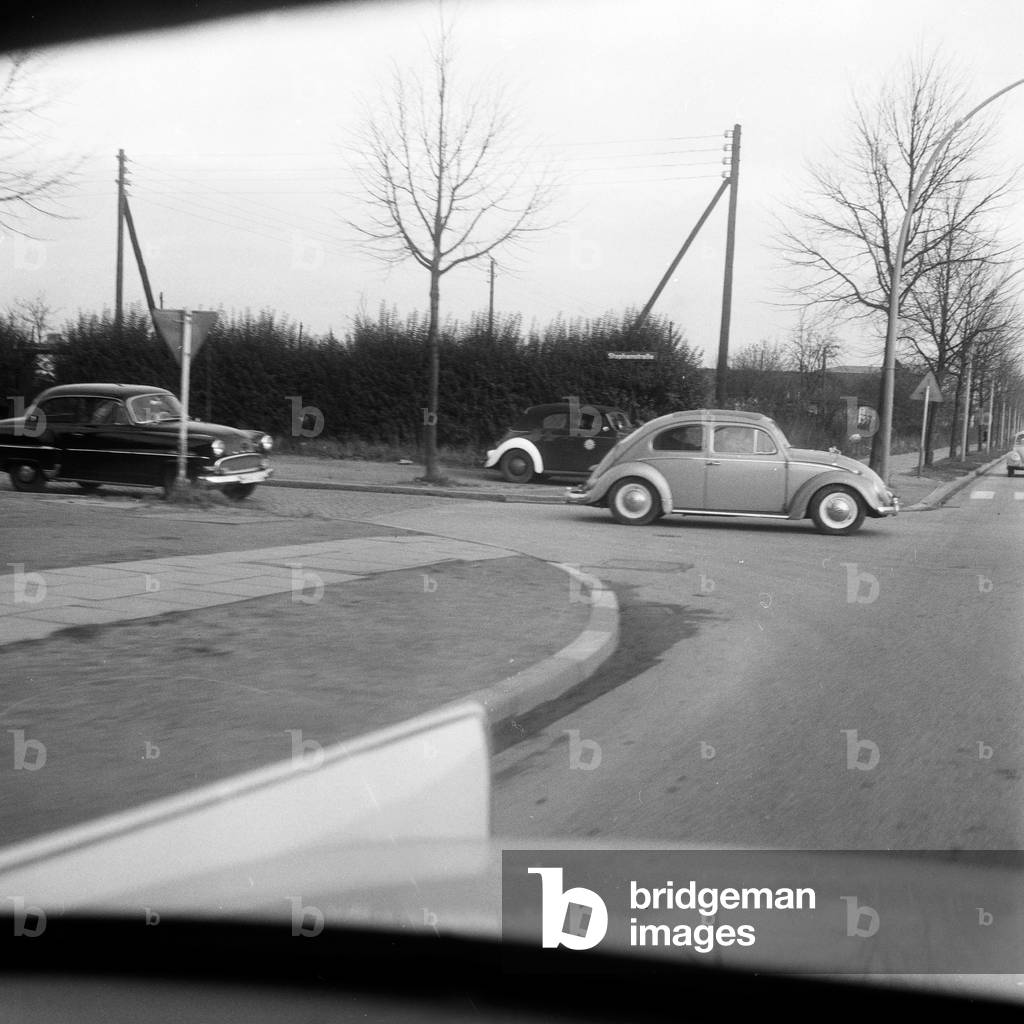 A car hitting several speed traps while driving through Greater Hamburg, Germany 1960s