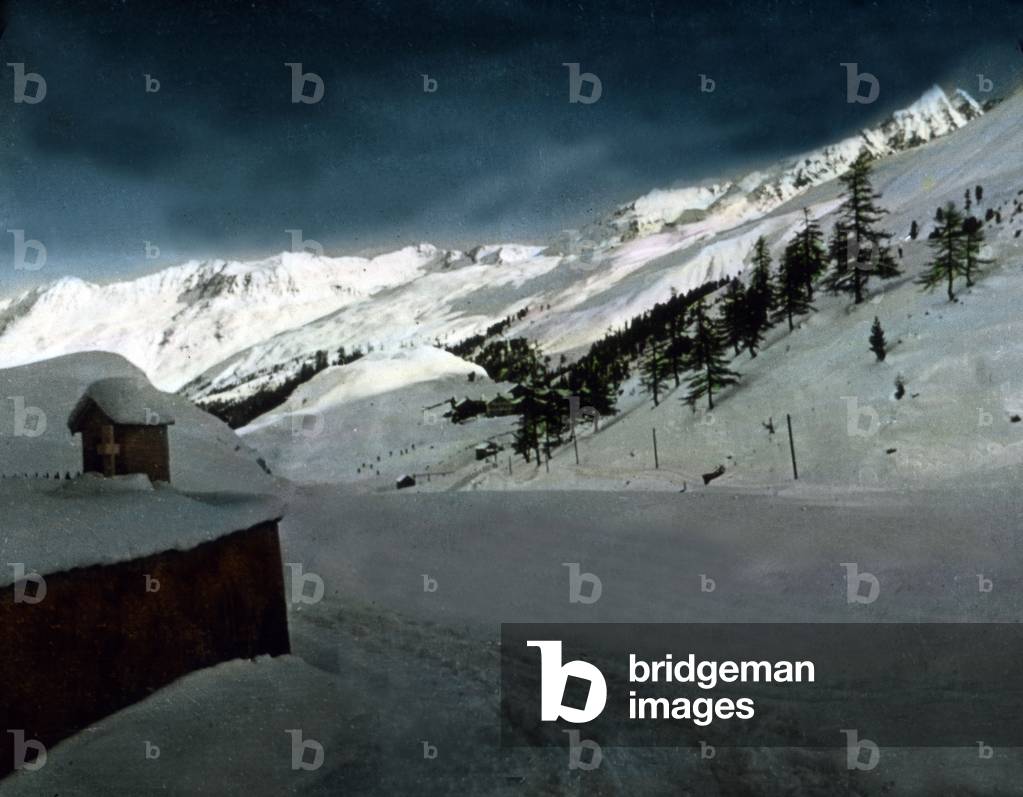 A snowed in hut alongside a way of a mountain track at Tyrol, 1920s