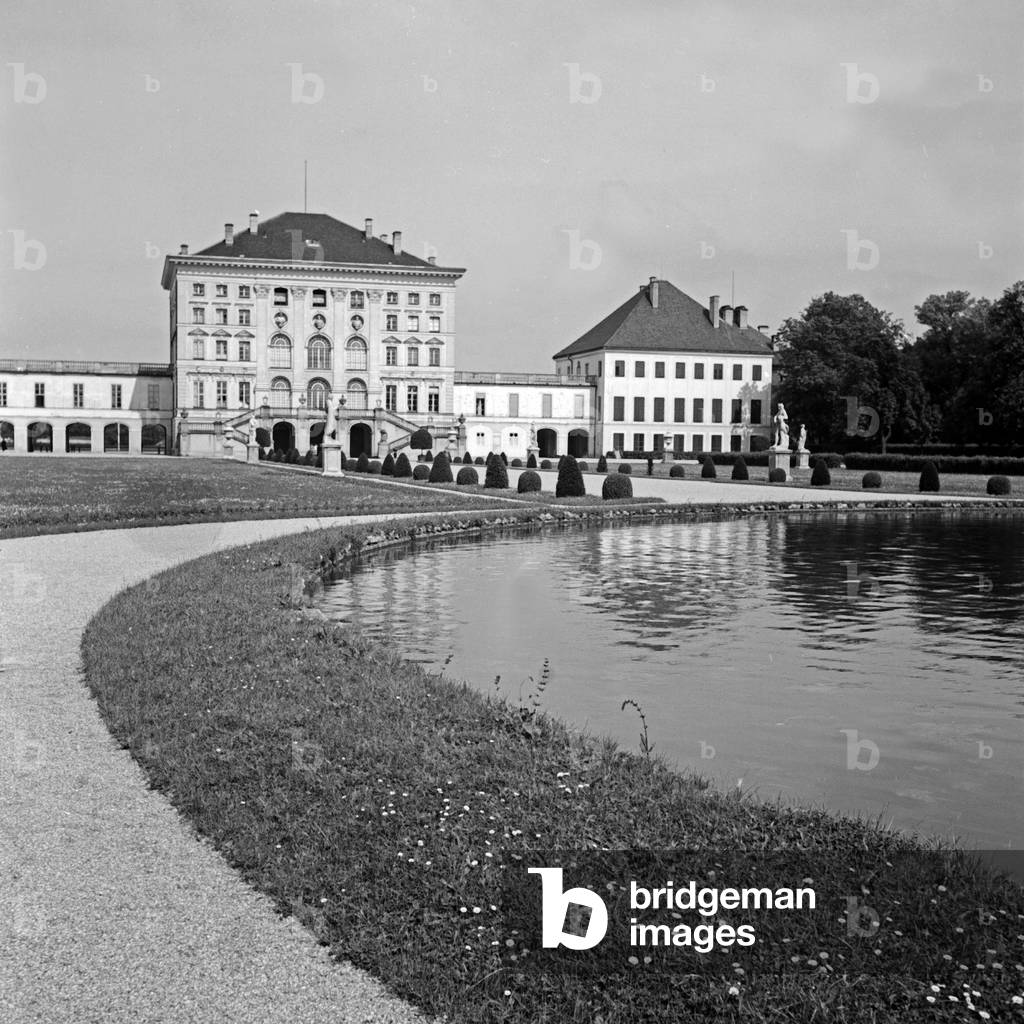 At the park of Nymphenburg castle in the West of Munich, Germany 1930s (b/w photo)