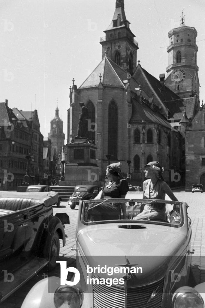 Parking cars in front of the Stiftskirche (Collegiate Church) in Stuttgart, Germany 1930s (b/w photo)