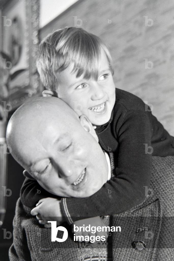 Father and son of a extended family, Germany 1930s (b/w photo)