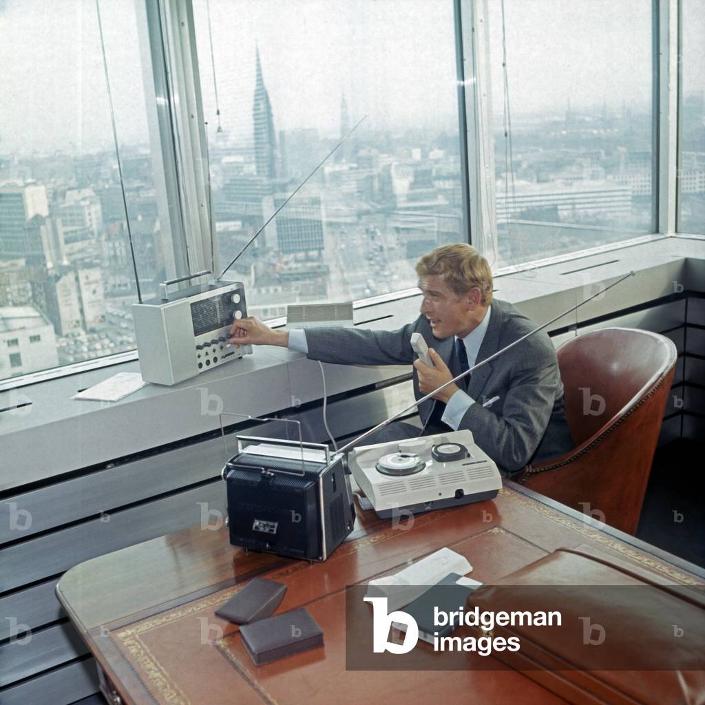 Austrian German actor Hans von Borsody in a German TV crime series in his office at Hamburg, ca 1967