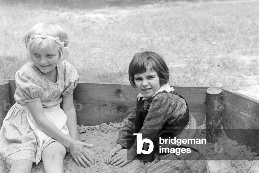 Scenes from childhood in Germany during the 1930s (b/w photo)