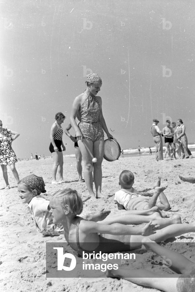 Entertainment for children on East Frisian island of Juist, Germany 1930s (b/w photo)