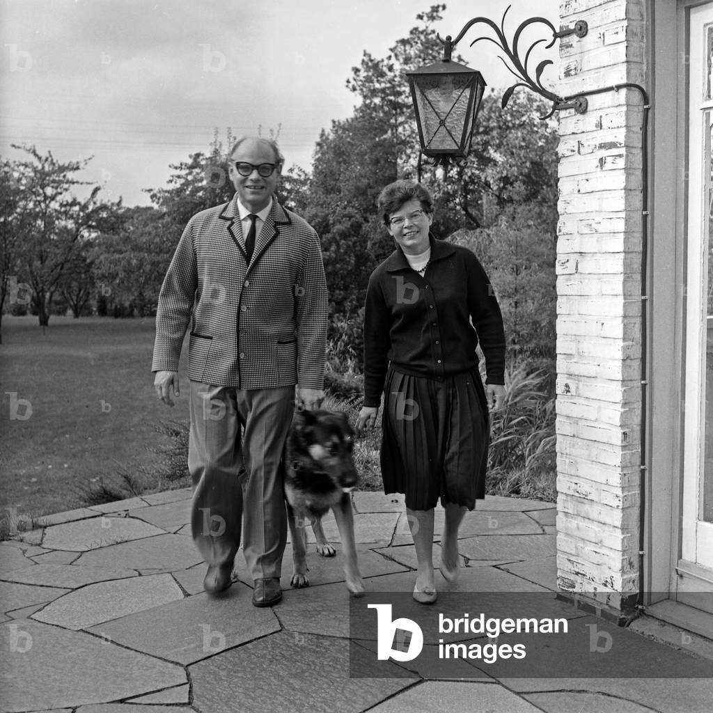 German soundtrack and audio play music composer Siegfried Franz with his wife Dorothea and their dog at Hamburg, Germany 1960s