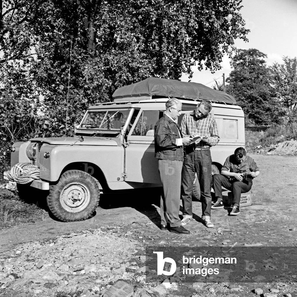 On the road with German TV director Udo Langhoff (left), Germany 1960s