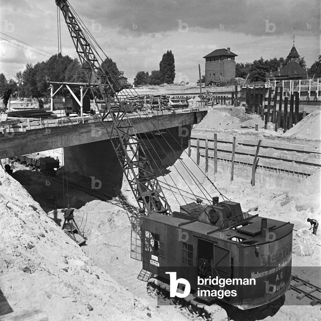 Motor feeder at Reichsautobahn highway - continous construction of the motorway feeder although the war at Nikolassee, Germany 1940 (b/w photo)