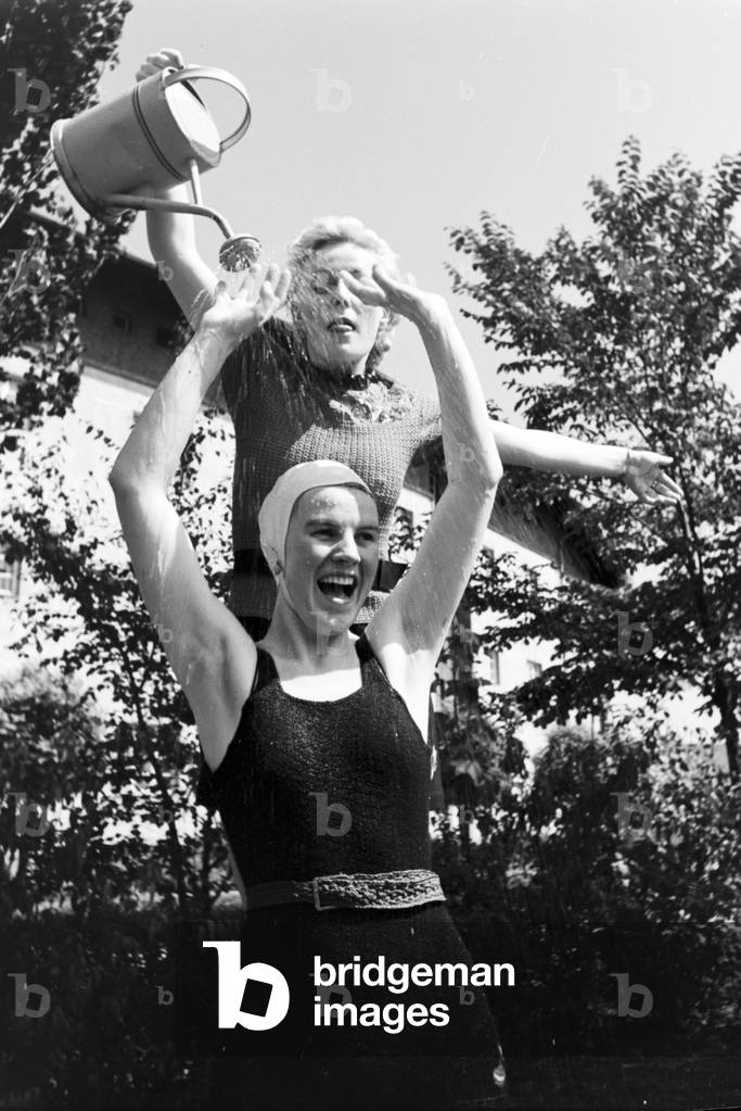 A family in their garden, Germany 1930s (b/w photo)