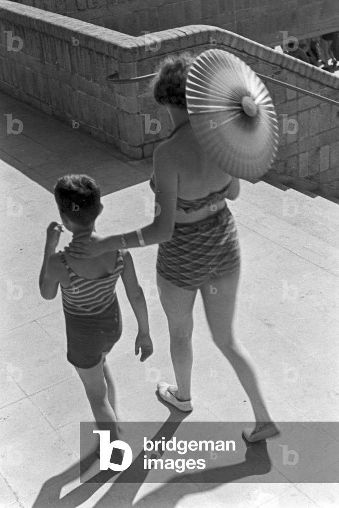Mother and son at lake Wannsee lido in Berlin, Germany 1930s (b/w photo)