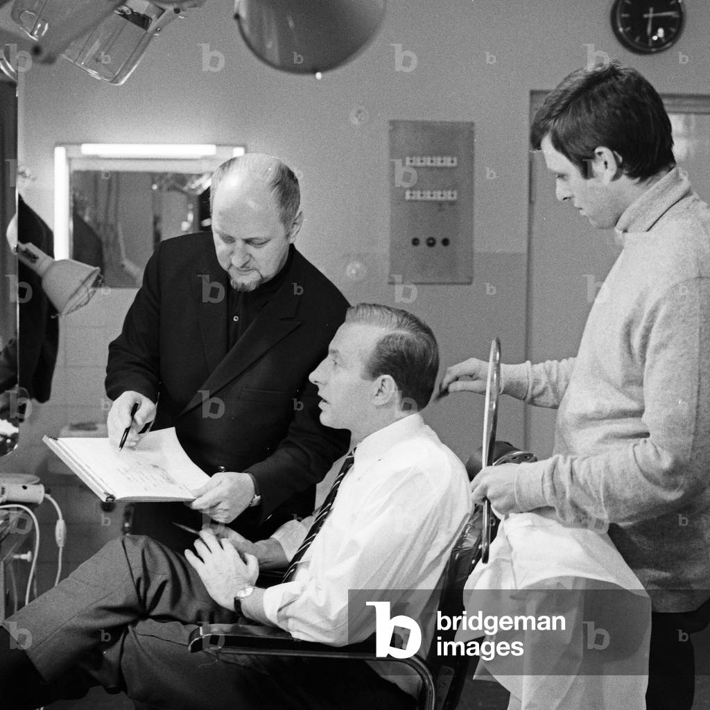 German news presenter Karl Heinz Koepcke at editor's office of news show 