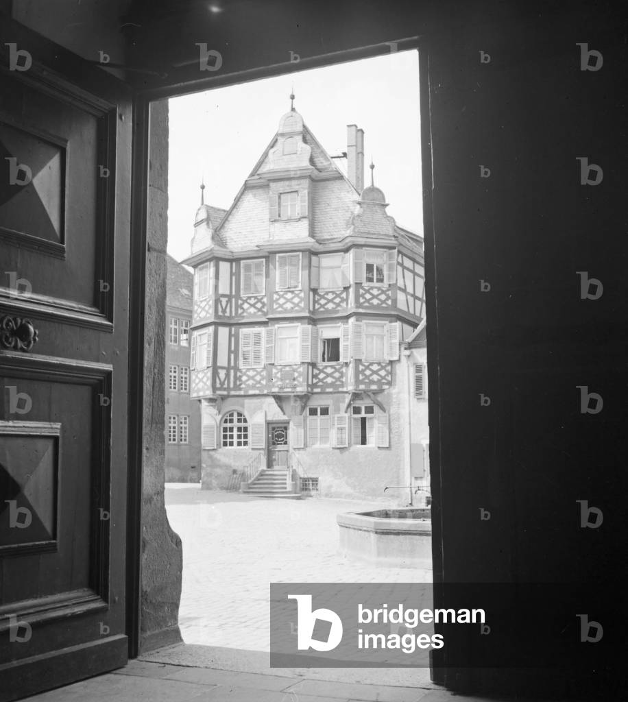 Half-timber house in the historic district, Germany 1930s (b/w photo)