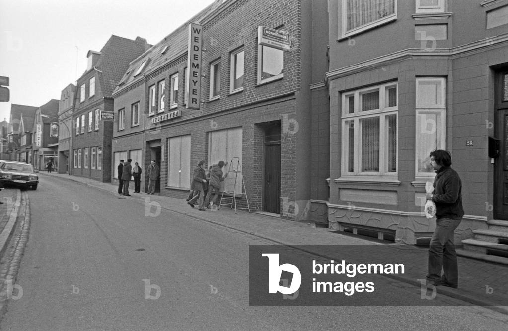 Inhabitants of Brokdorf taking care for their windows before the demonstration, Germany 1980s