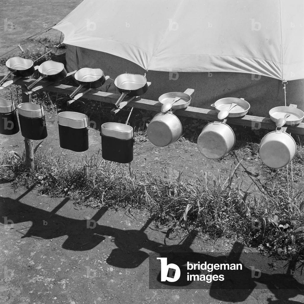 Billy tins drying in the sun at Hitler youth camp, Austria 1930s (b/w photo)