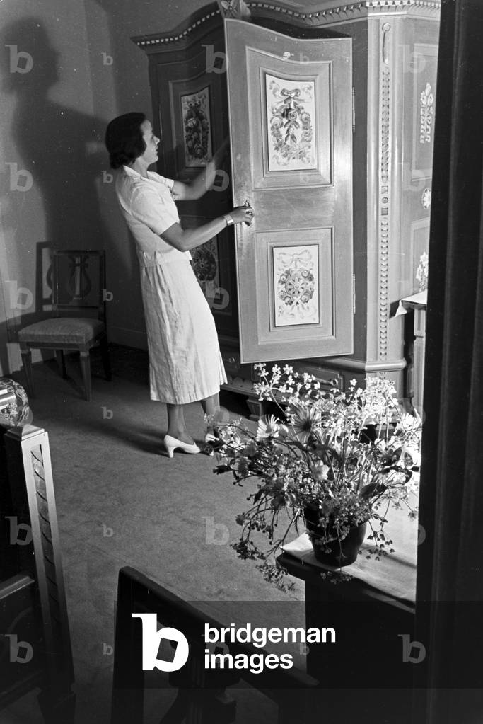 Relaxation in the Hotel during a journey in the Black Forest, Germany 1930s (b/w photo)