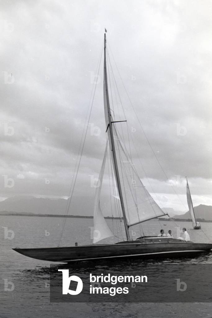 A group of sailors floating over the Chiemsee in a boat, Germany 1930s (b/w photo)