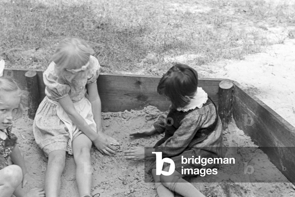 Scenes from childhood in Germany during the 1930s (b/w photo)