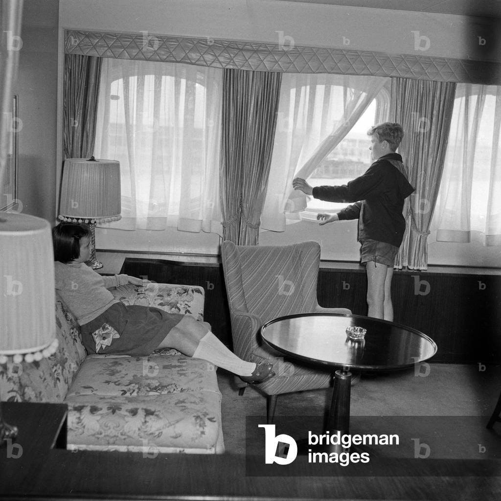 A boy and a girl in the cabin of a ship, Germany 1950s