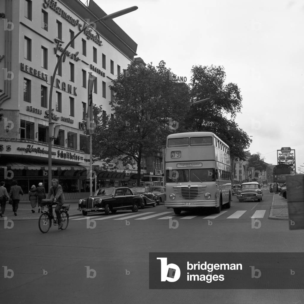 Bus line 19 with drection Tempelhof at Kurfuerstendamm avenue in Berlin, Germany 1950s