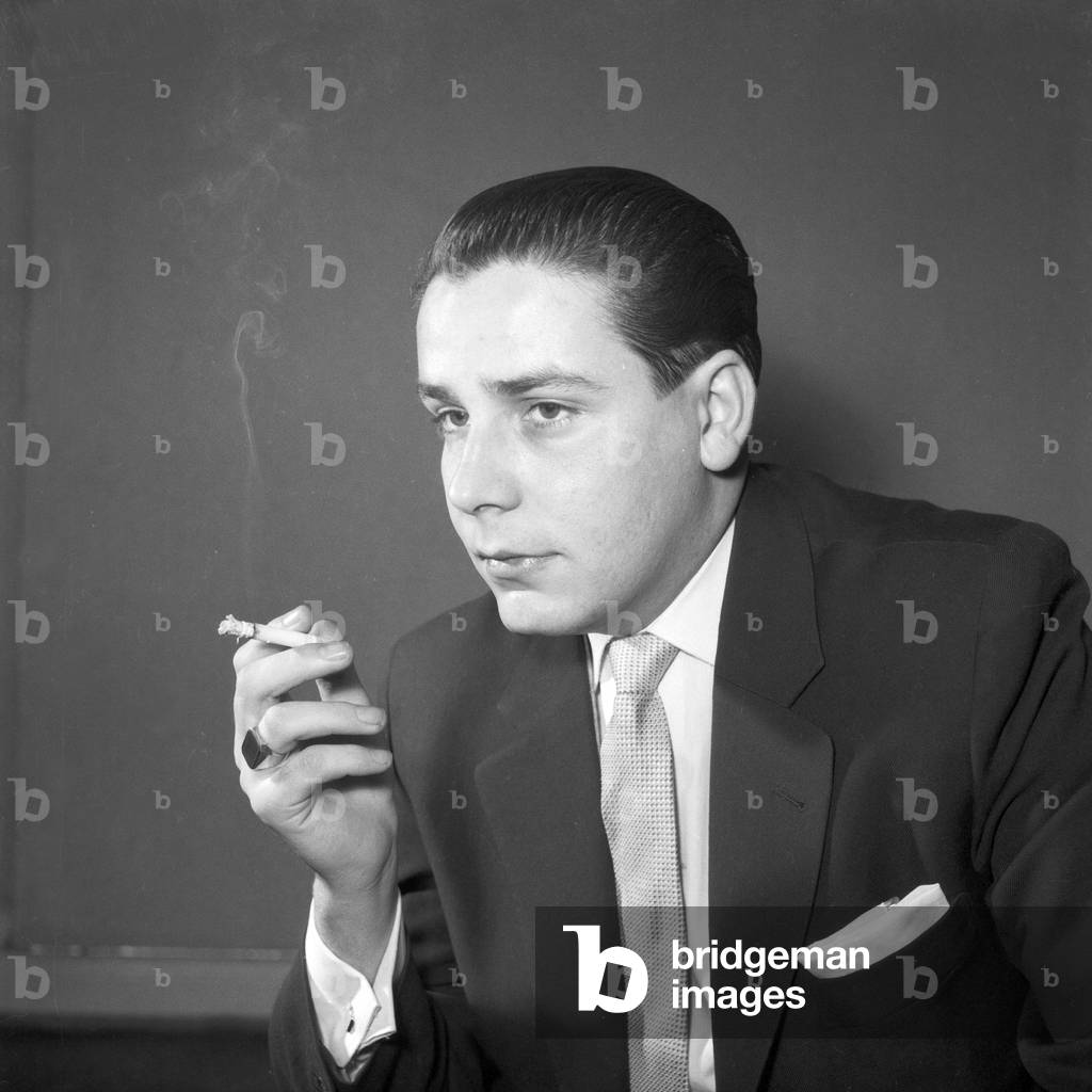 Portrait of young man, smoking a cigarette, Germany 1955