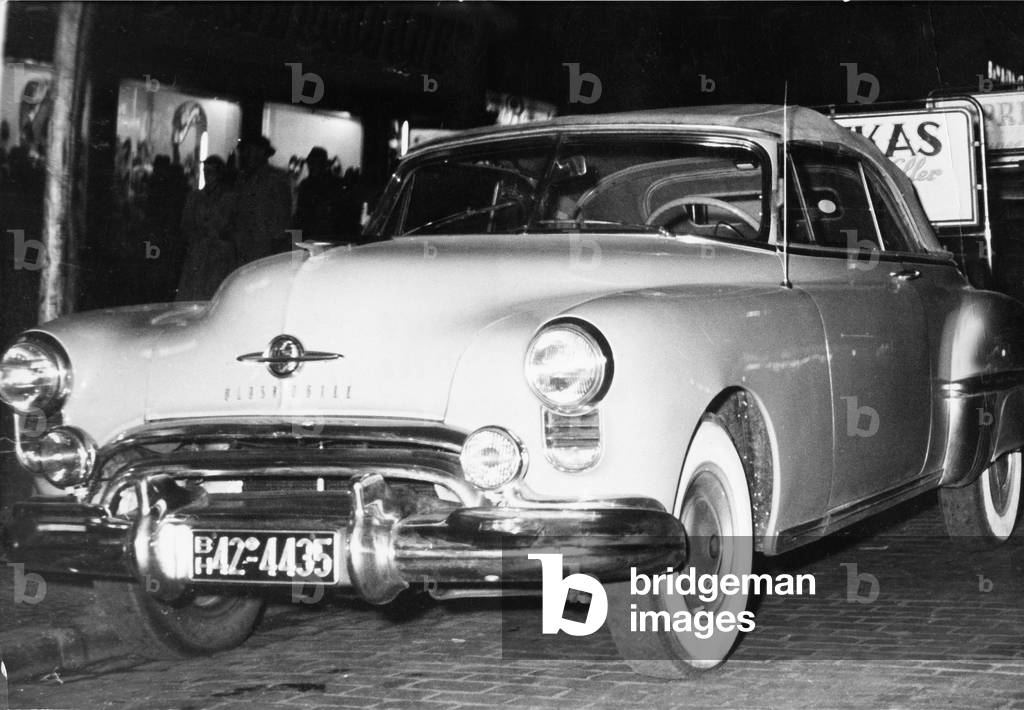 A 1953 Oldsmobile parking at Hamburg Reeperbahn, 1950s