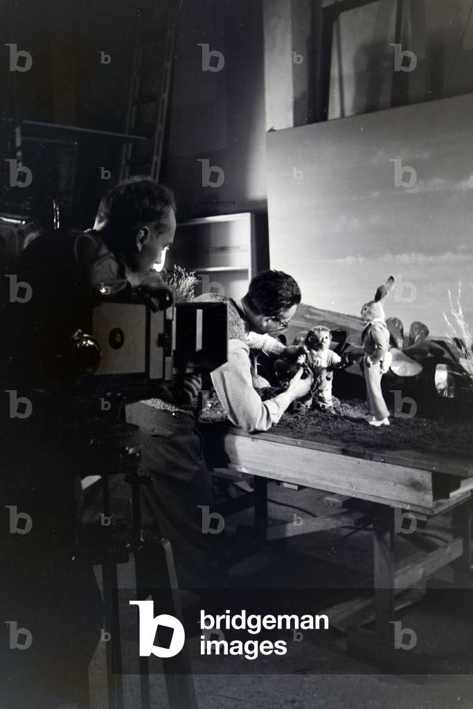 Shooting on the set of the puppet movie The Rabbit an the Hedgehog with the character Mecki, produced and directed by the Diehl brothers, Germany 1930s (b/w photo)