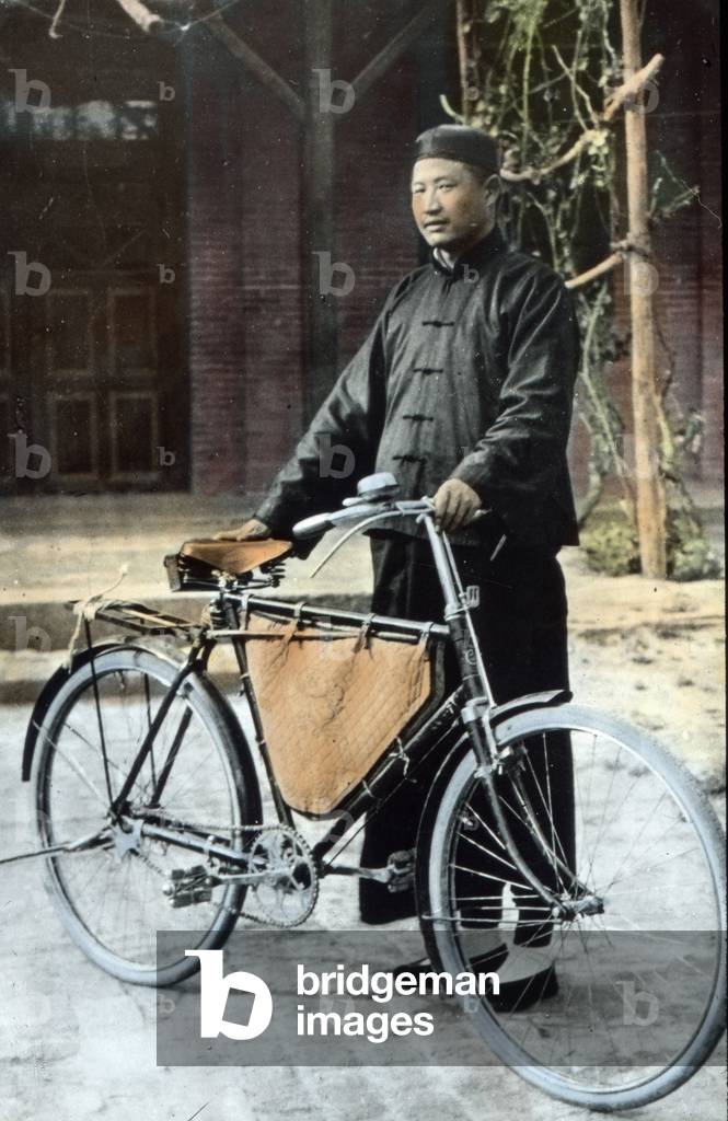 China, Peking, Beijing, Chinese with bicycle, image date: circa 1910, Carl Simon Archive