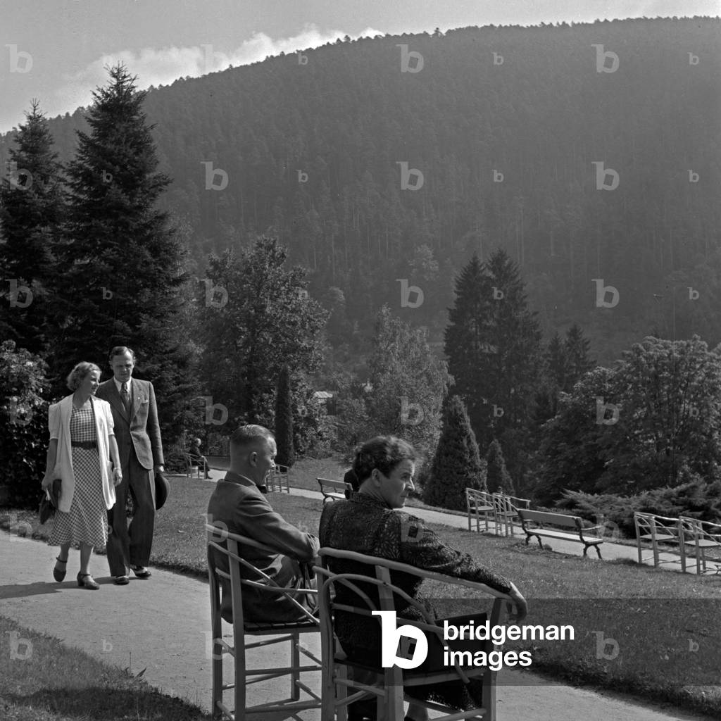 Spa guests relaing in the fresh air round and about Wildbad at Black Forest, Germany 1930s (b/w photo)