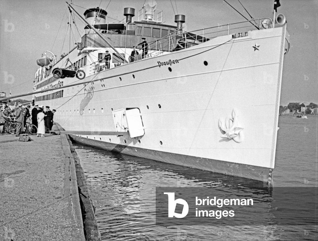 A motorbike is loaded on board of the 