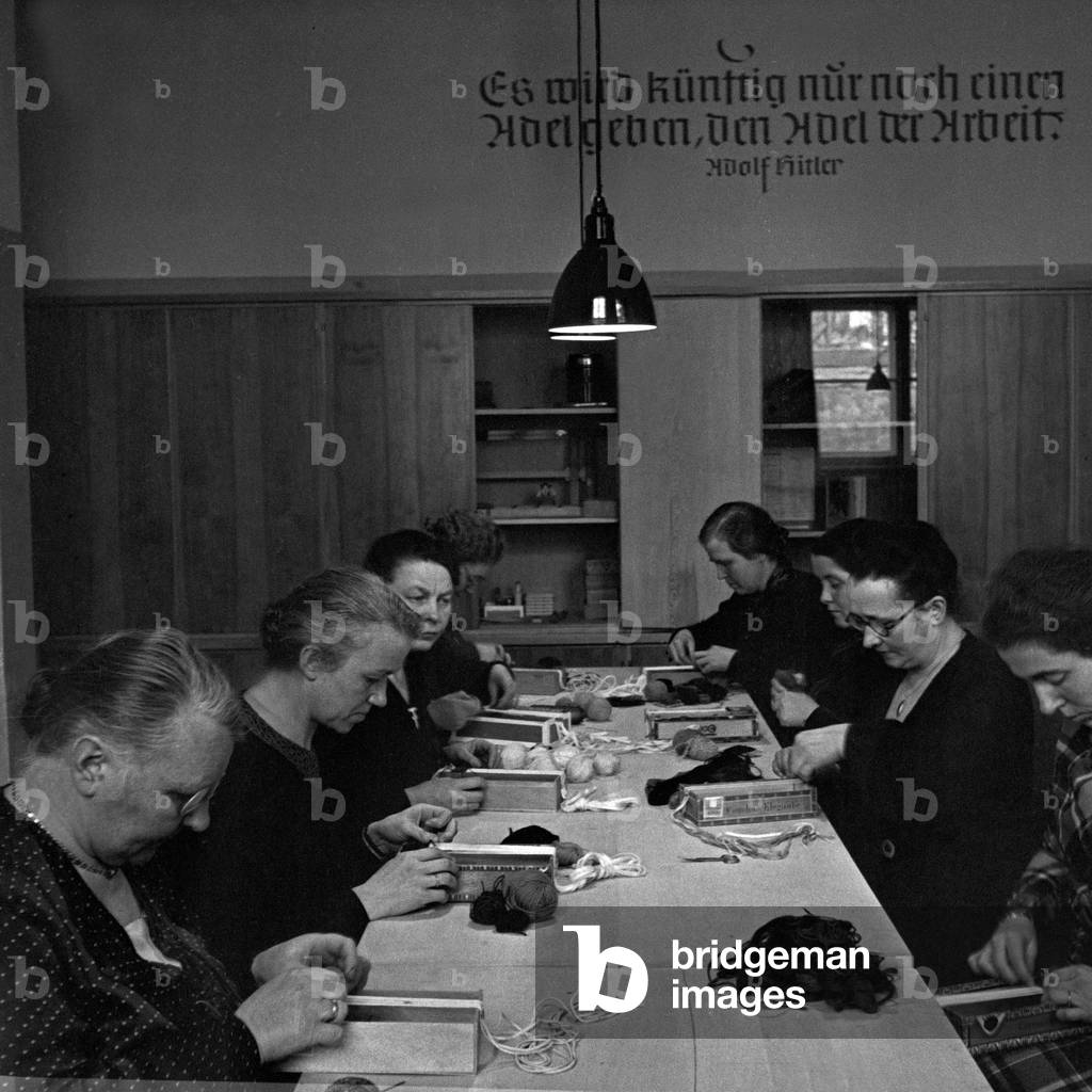 Women doing some handwork at a mother training of the Reichsmuetterdienst, Germany 1930s