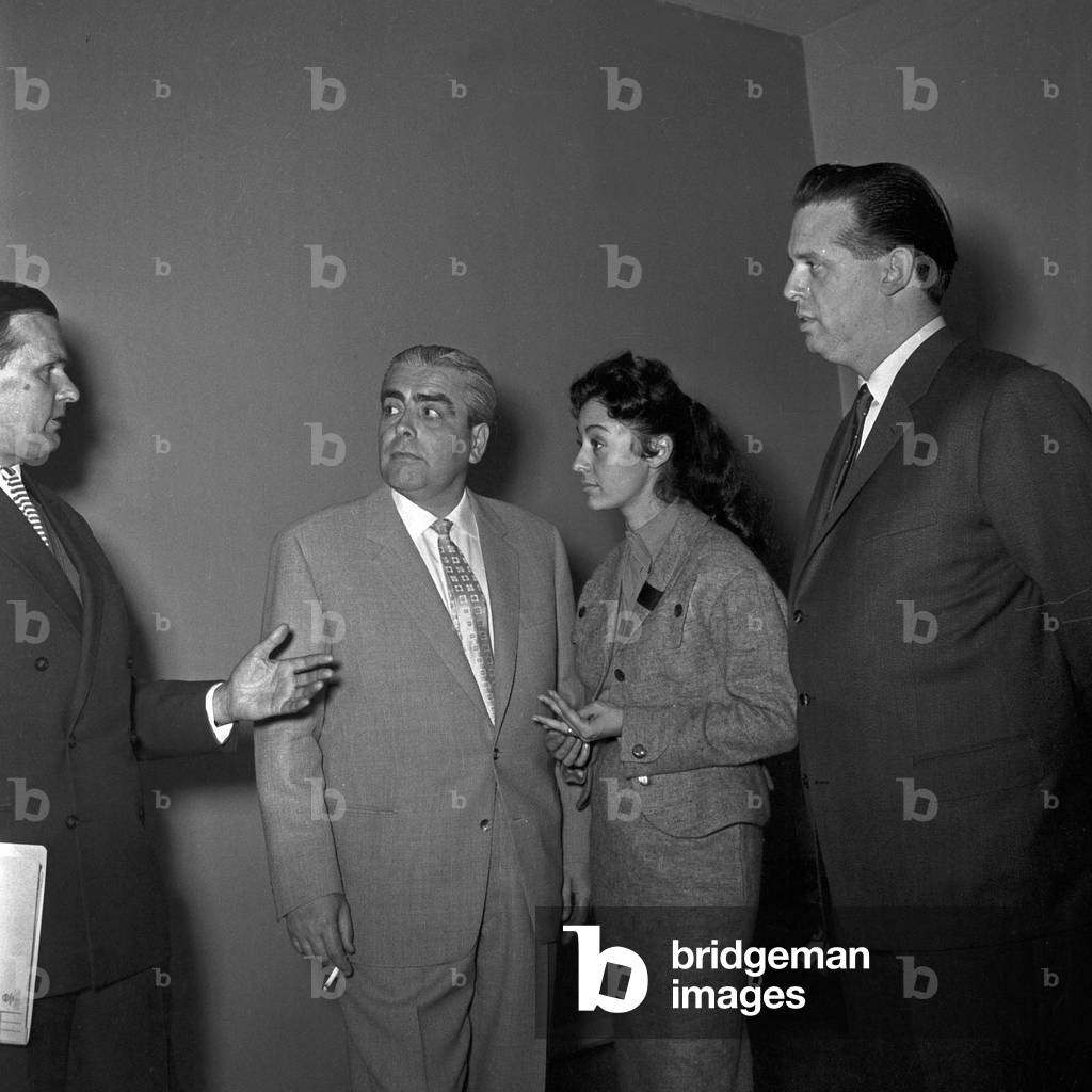 Singer Caterina Valente talking to managers of German TV and radio station NDR at Hamburg, Germany 1950s