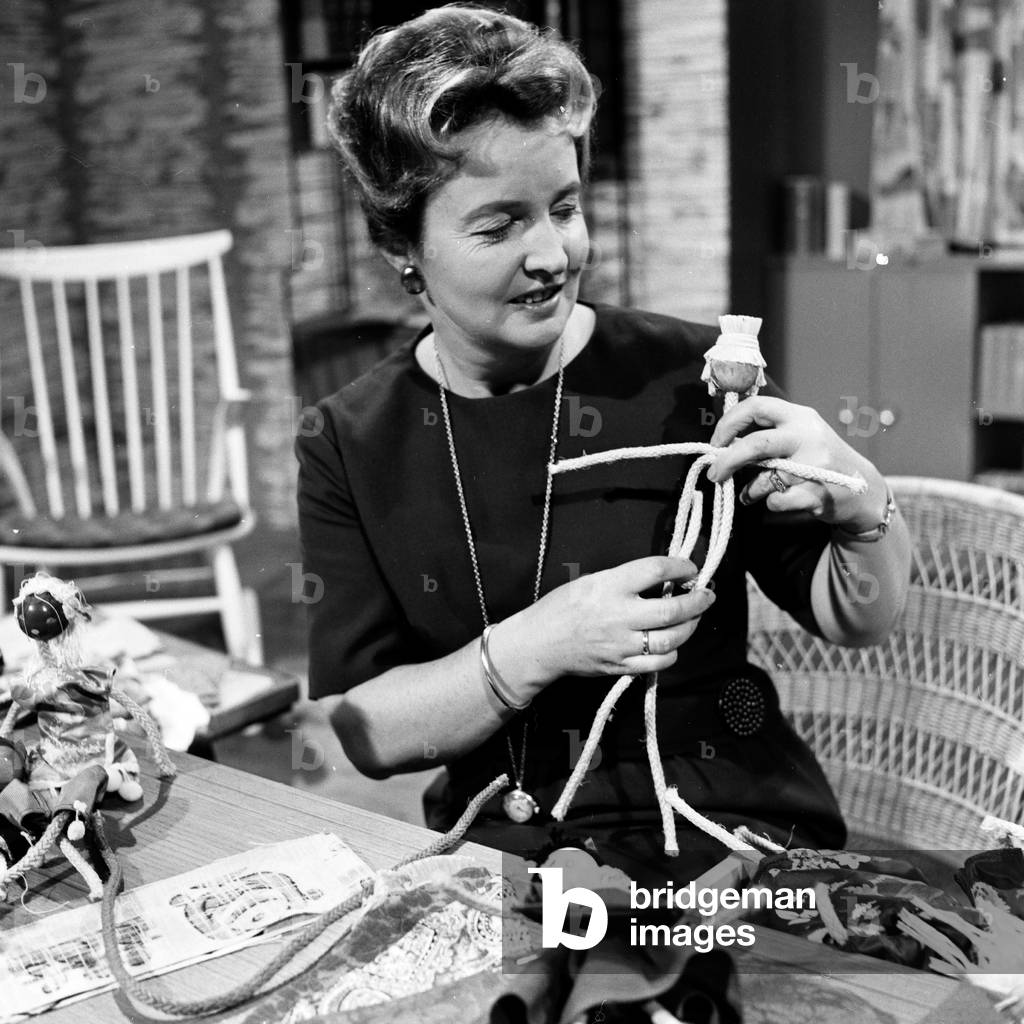Mrs Schulze in a handicraft show for chilren's television of German TV station NDR at Hamburg, Germany 1960s