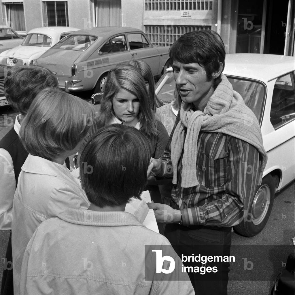 German singer Udo Juergens signing autographs, Hamburg 1970s